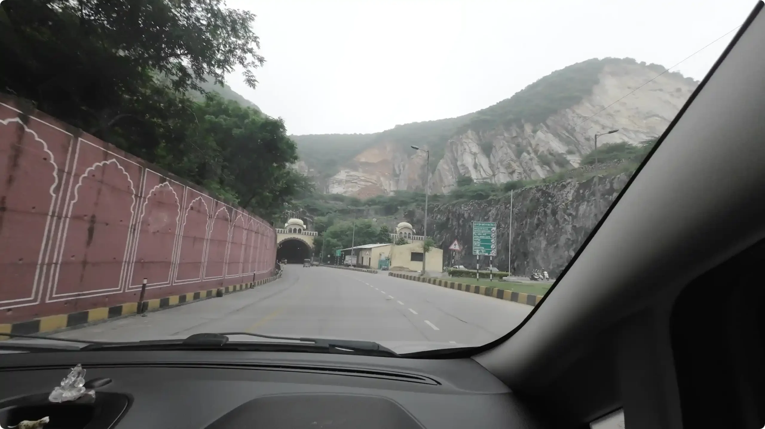 A dashboard view from inside a Ford Ecosport leaving the city streets of Jaipur on a cloudy morning road trip